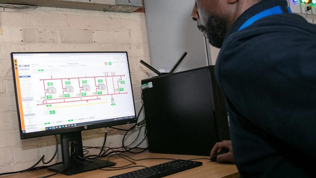 a building management system dashboard showing energy and equipment data