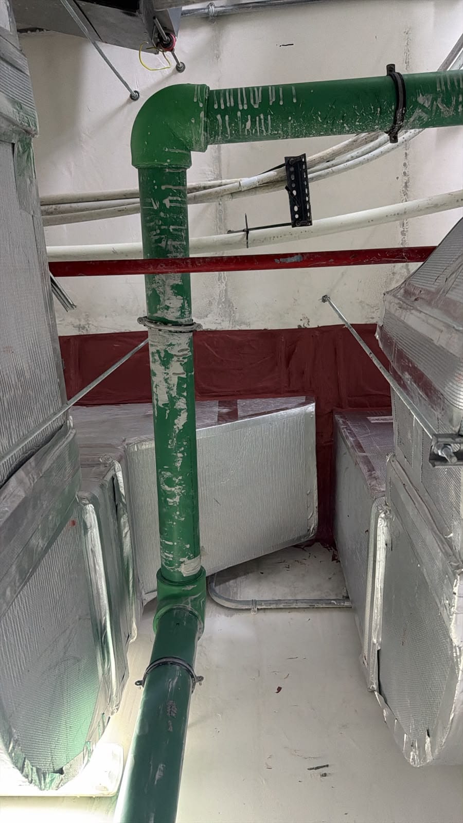 Ductwork and insulation above a ceiling void